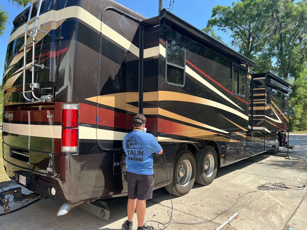 DIY-Friendly Installation RV tech installing Guardian Plates on a motor coach.